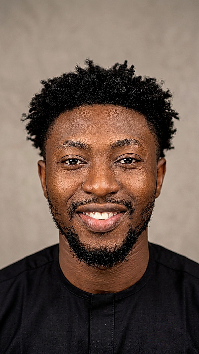 Portrait of Isheno Ebenezer smiling